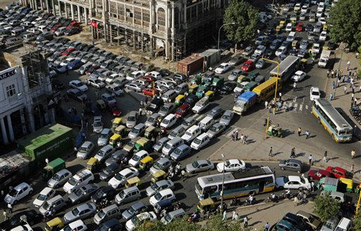 Traffic stands clogged near Connaught Place, a central commercial area, in New Delhi, India, Tuesday, Oct. 6, 2009. A police security drill and rush ahead of the Hindu festival of Karwa Chauth caused the afternoon pile up of traffic in many parts of central Delhi. (AP Photo/Gurinder Osan)